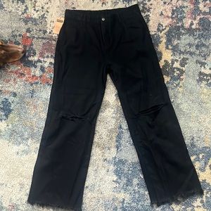 Black lightly distressed wide leg jeans